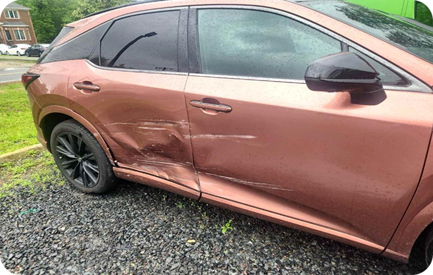 Before collision repair - Rose gold SUV with side damage